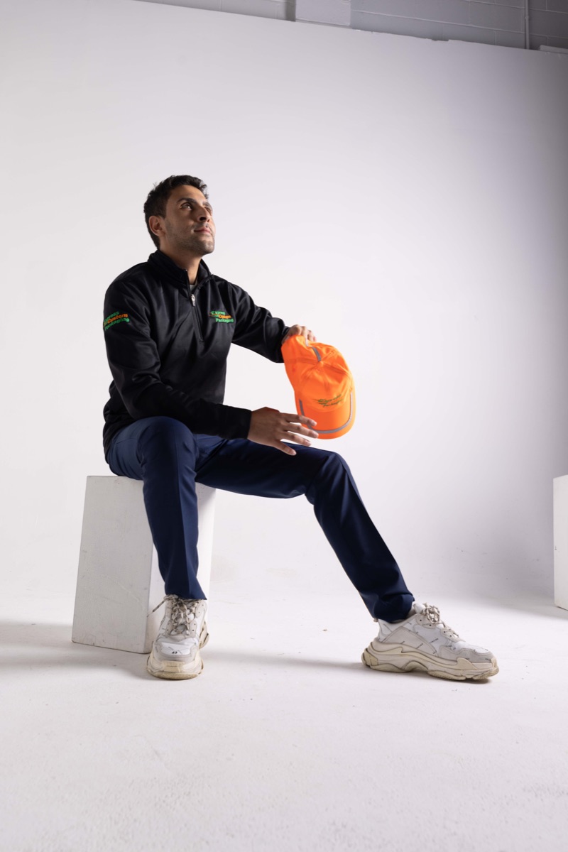 Adam Zak photographed in Express Custom Packaging workwear